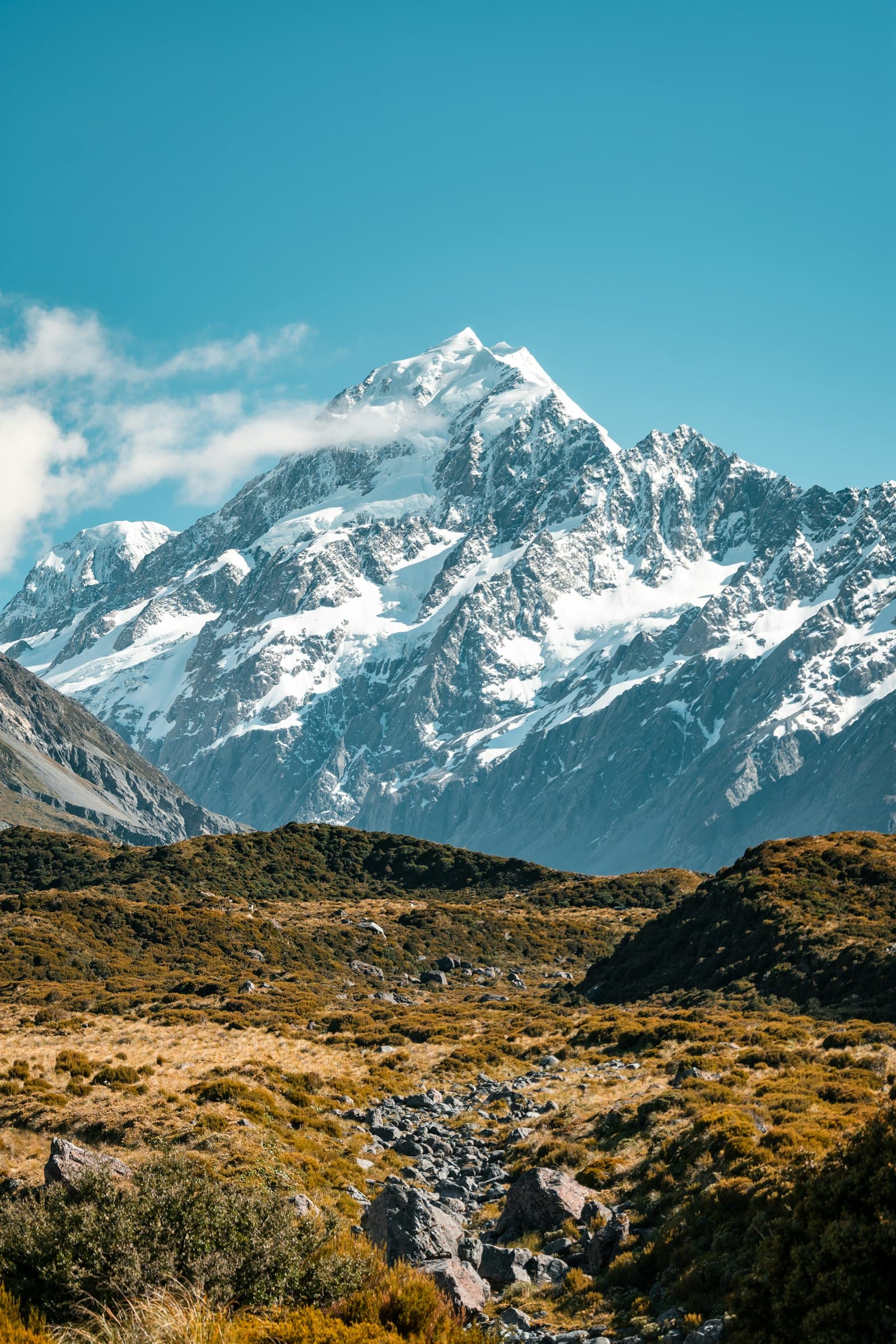 Snow-capped mountain peak under a clear blue sky in northern Pakistan